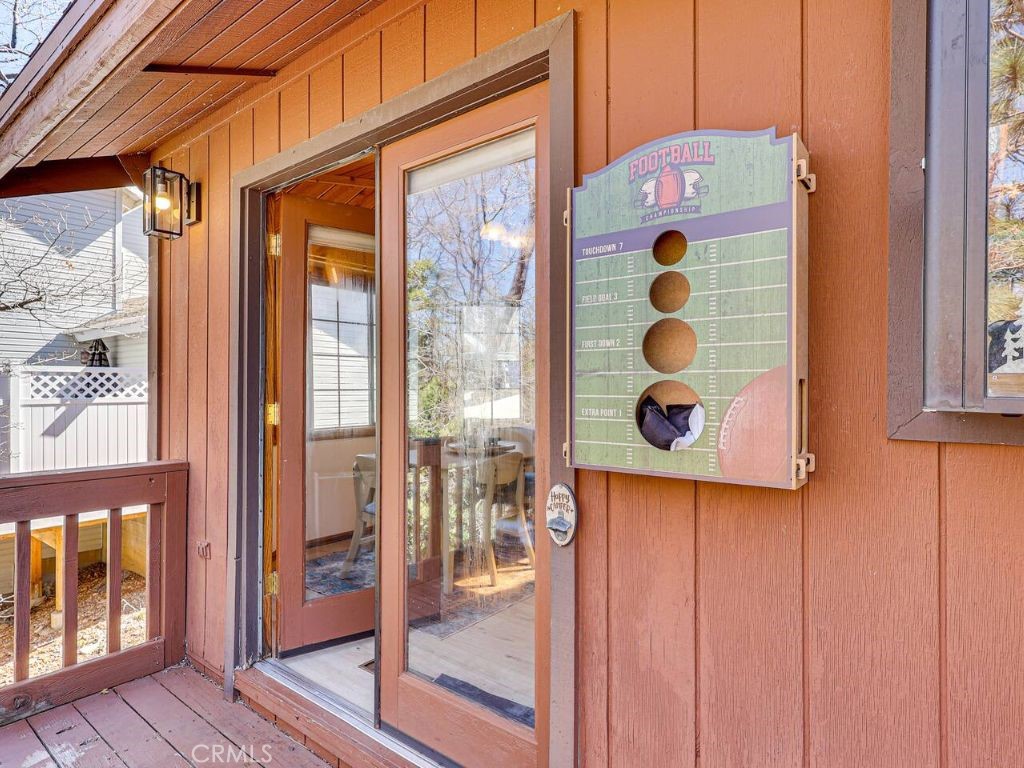 452 Orange Sugarloaf, CA 92386 - Photo 22 of 29 a front view of a house with a glass door