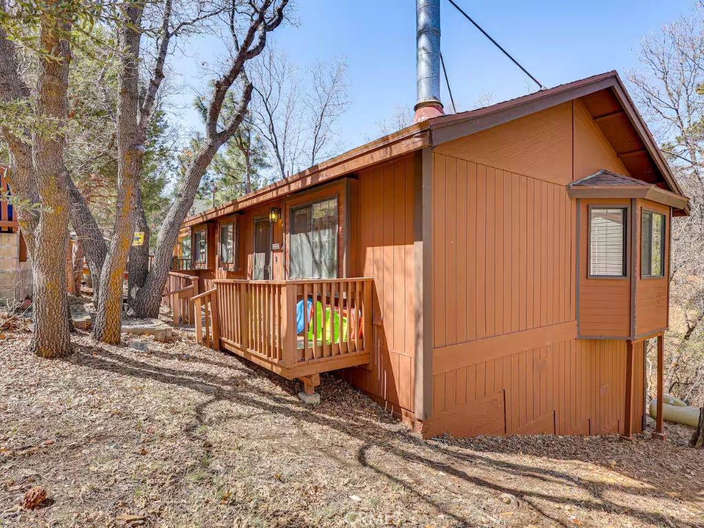 452 Orange Sugarloaf, CA 92386 - Photo 26 of 29 a view of a house with wooden fence