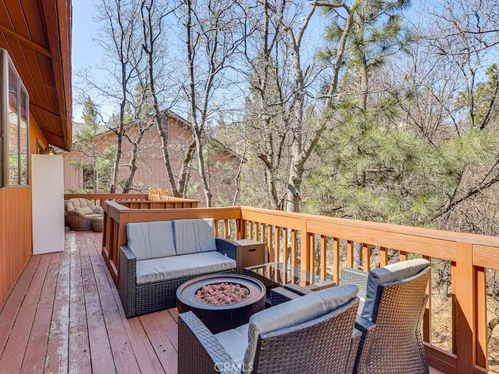 452 Orange Sugarloaf, CA 92386 - Photo 3 of 29 a view of balcony with furniture and wooden floor