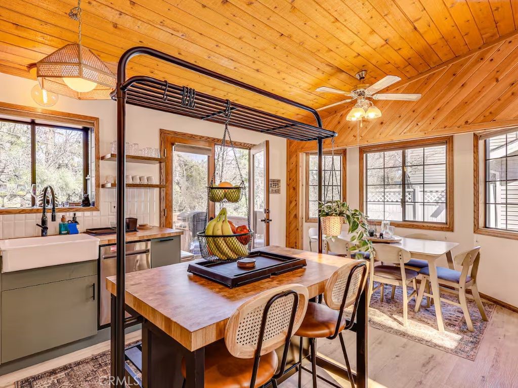 452 Orange Sugarloaf, CA 92386 - Photo 10 of 29 a view of a dining room with furniture window and outside view