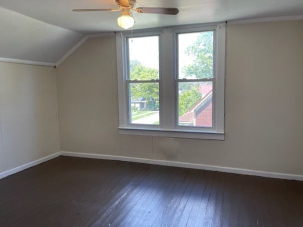 301 Bennett Street Decherd, TN 37324 - Photo 21 of 41 an empty room with wooden floor and windows