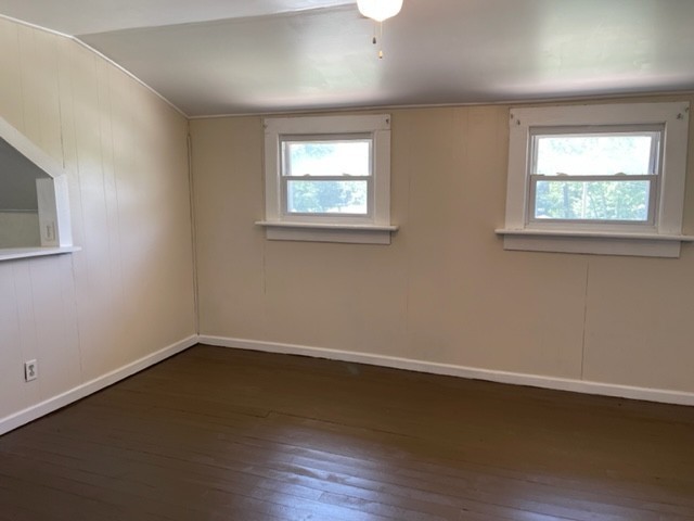 301 Bennett Street Decherd, TN 37324 - Photo 21 of 35 a view of a room with wooden floor and windows in it