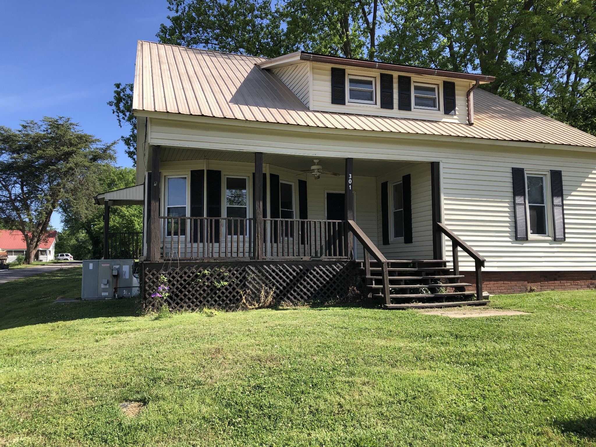 301 Bennett Street Decherd, TN 37324 - Photo 35 of 41 a view of a house with a yard