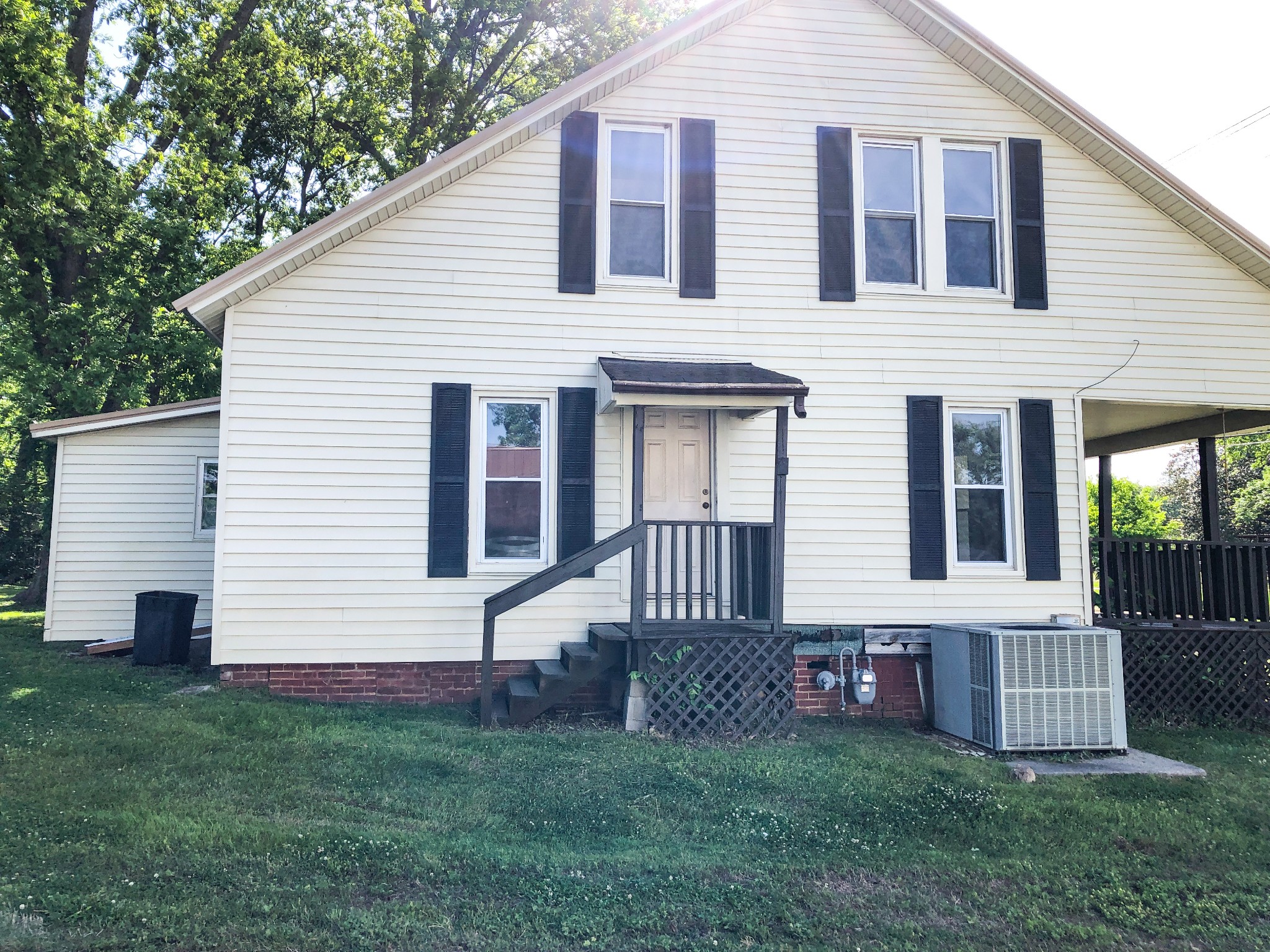 301 Bennett Street Decherd, TN 37324 - Photo 37 of 41 a view of a house with a yard and a large window