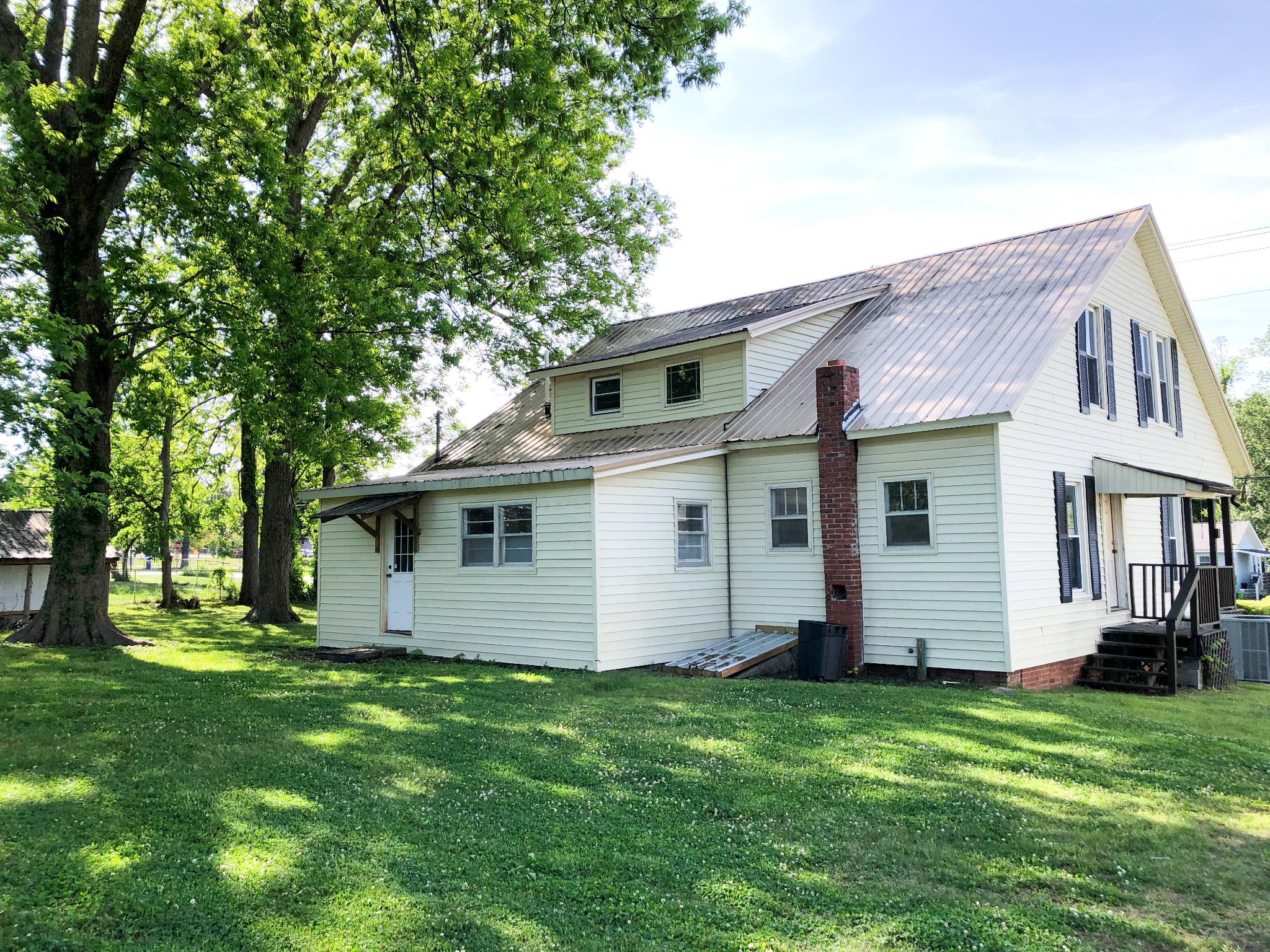 301 Bennett Street Decherd, TN 37324 - Photo 38 of 41 a view of a house with backyard