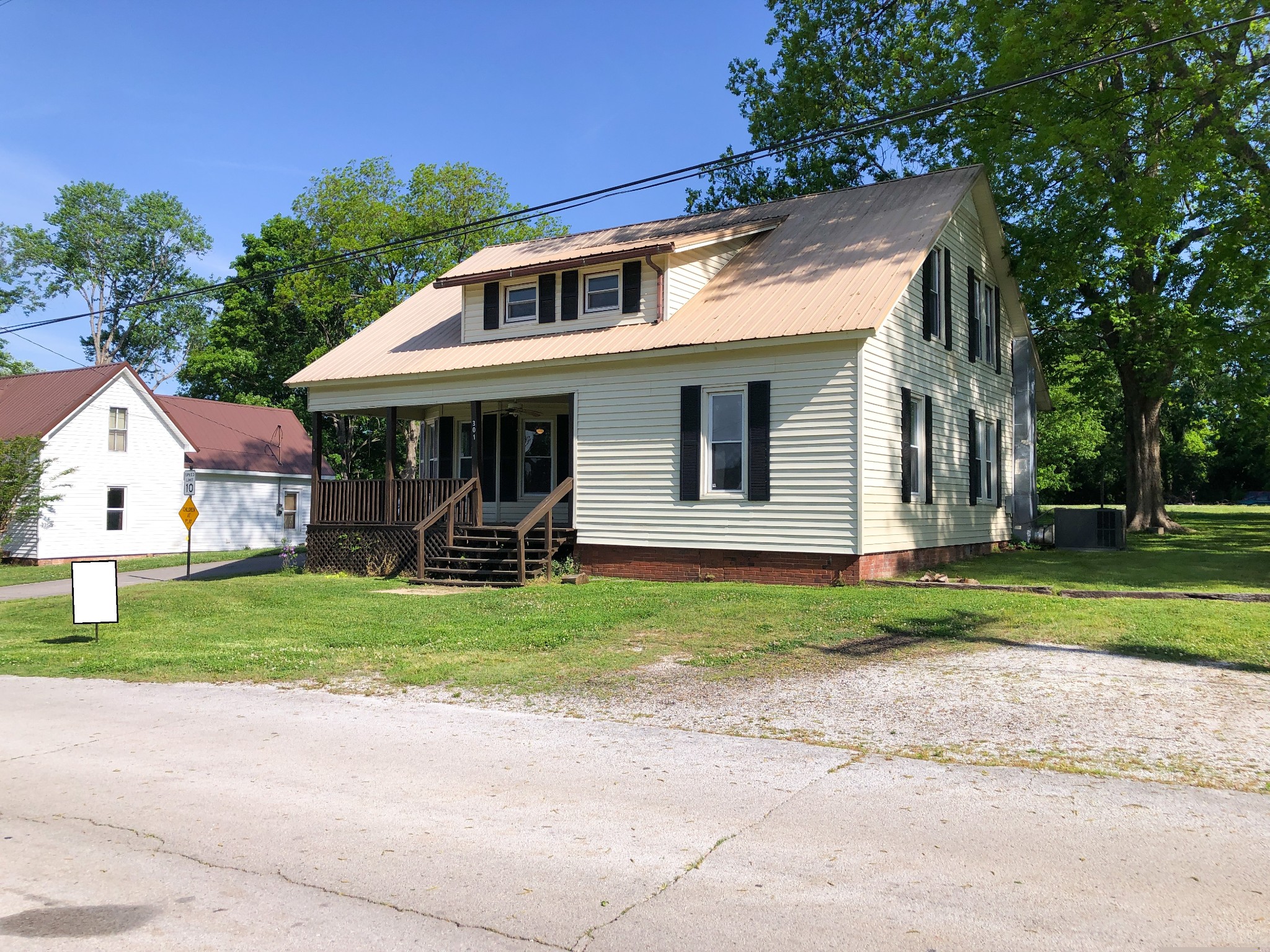 301 Bennett Street Decherd, TN 37324 - Photo 40 of 41 a view of a yard in front view of a house
