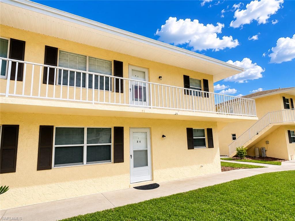 3325 Airport Road North, Unit R4 Naples, FL 34105 - Photo 1 of 18 Convenient first floor end unit