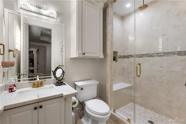 a bedroom with a bed and a book shelf