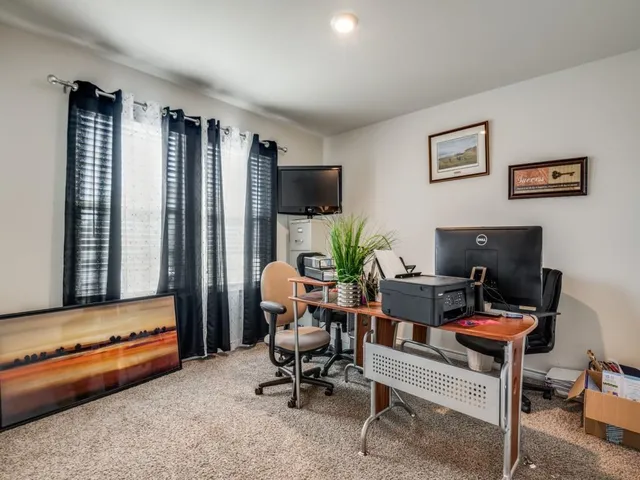 a bathroom with a shower and a sink