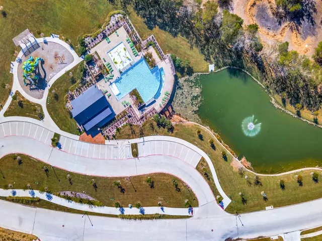 a view of a house with a swimming pool
