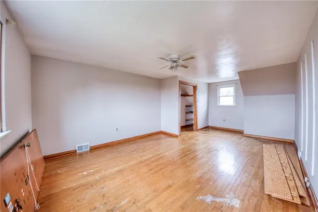 a view of an empty room and window