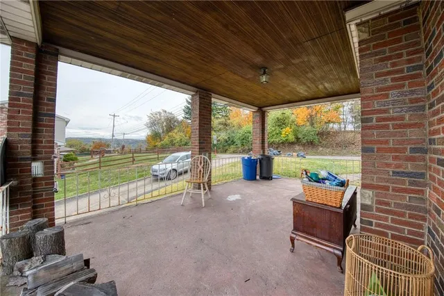 a aerial view of a house with a swimming pool