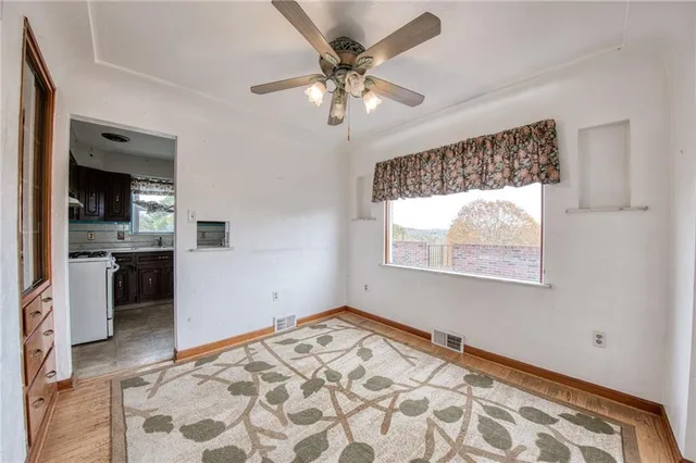 a view of an empty room and window