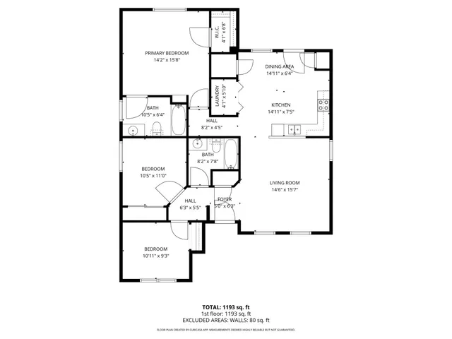 a picture of a bench in front of a wall