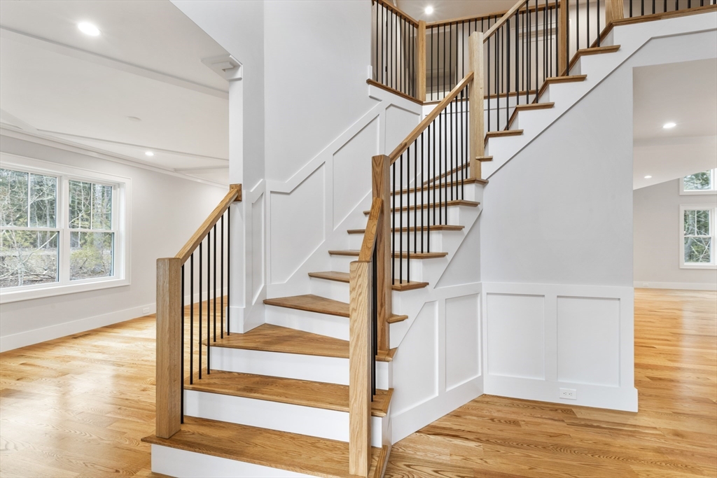 102 Pine Street Norton, MA 02766 - Photo 18 of 41 a view of entryway and hall with wooden floor