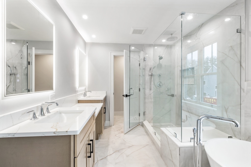 102 Pine Street Norton, MA 02766 - Photo 24 of 41 a bathroom with a sink tub shower and a mirror