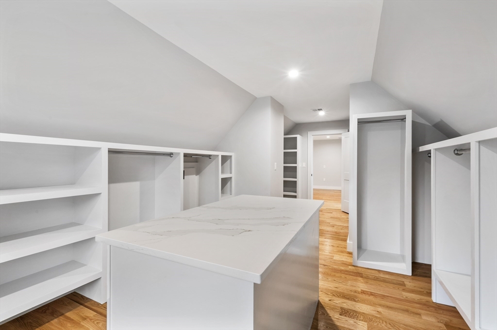 102 Pine Street Norton, MA 02766 - Photo 27 of 41 a room with a bed and cabinets