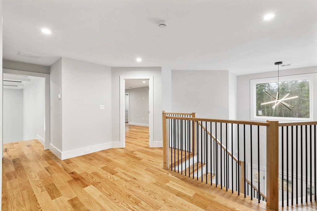 102 Pine Street Norton, MA 02766 - Photo 30 of 41 a view of a room with wooden floor