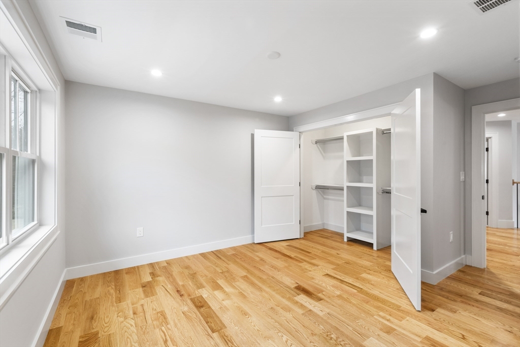 102 Pine Street Norton, MA 02766 - Photo 31 of 41 a bedroom with a bed and a window