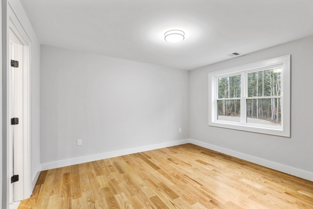 102 Pine Street Norton, MA 02766 - Photo 37 of 41 an empty room with a window