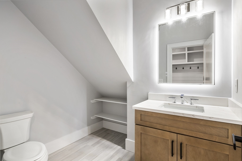 102 Pine Street Norton, MA 02766 - Photo 41 of 41 a bathroom with a sink toilet and vanity