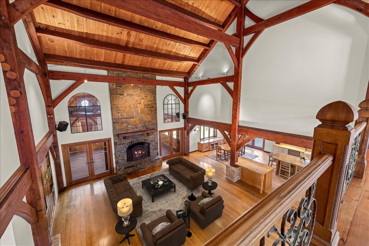 236 Steeplechase Road Barrington Hills, IL 60010 - Photo 11 of 69 a living room with furniture and a fireplace