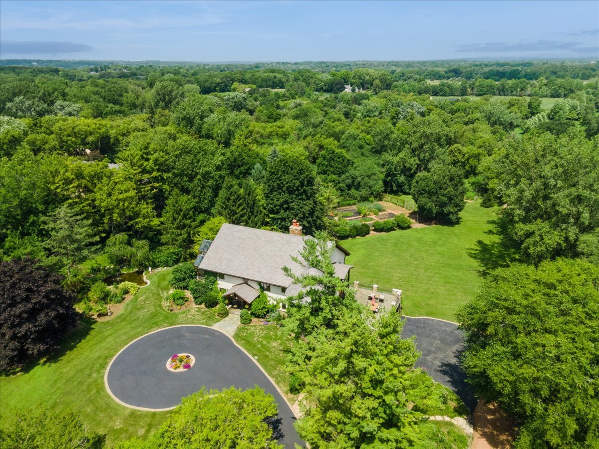 236 Steeplechase Road Barrington Hills, IL 60010 - Photo 4 of 69 an aerial view of a house