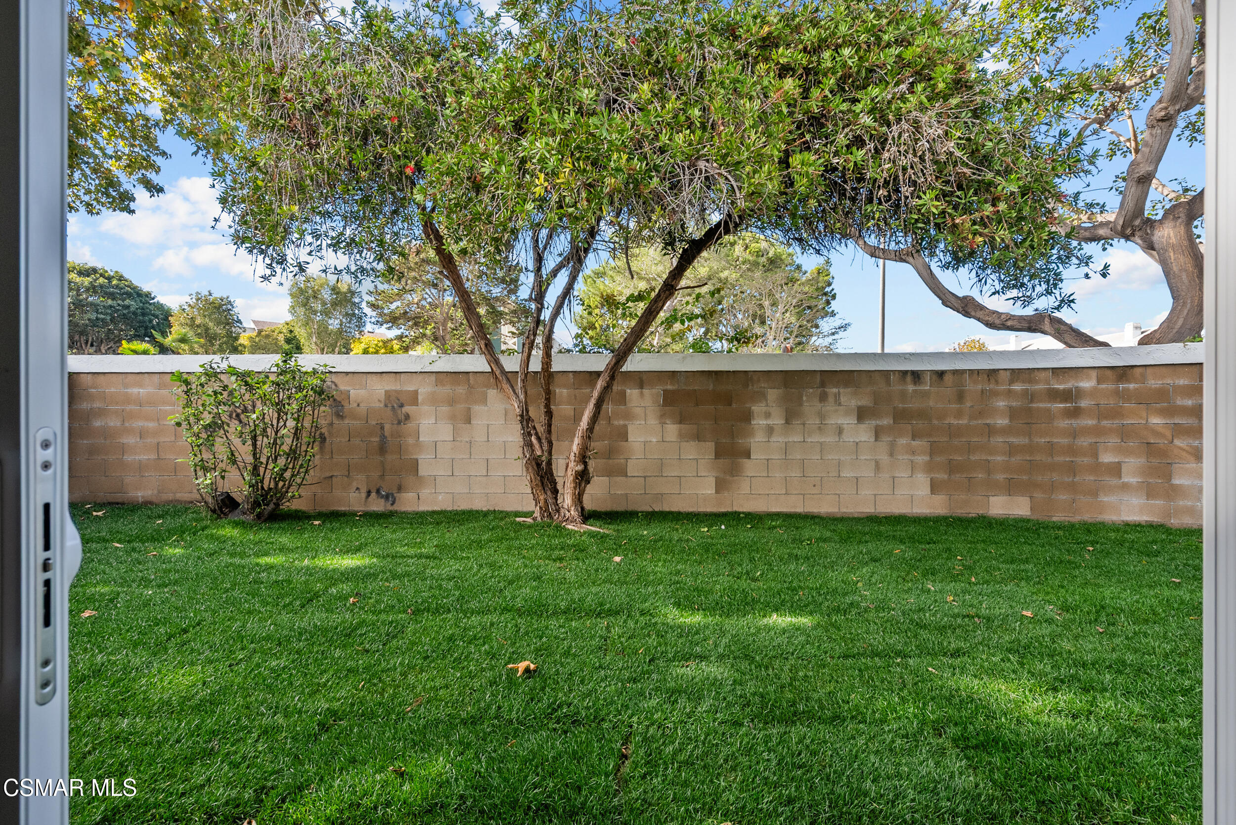 201 Village Road Port Hueneme, CA 93041 - Photo 12 of 21 a view of a yard with a house in the background