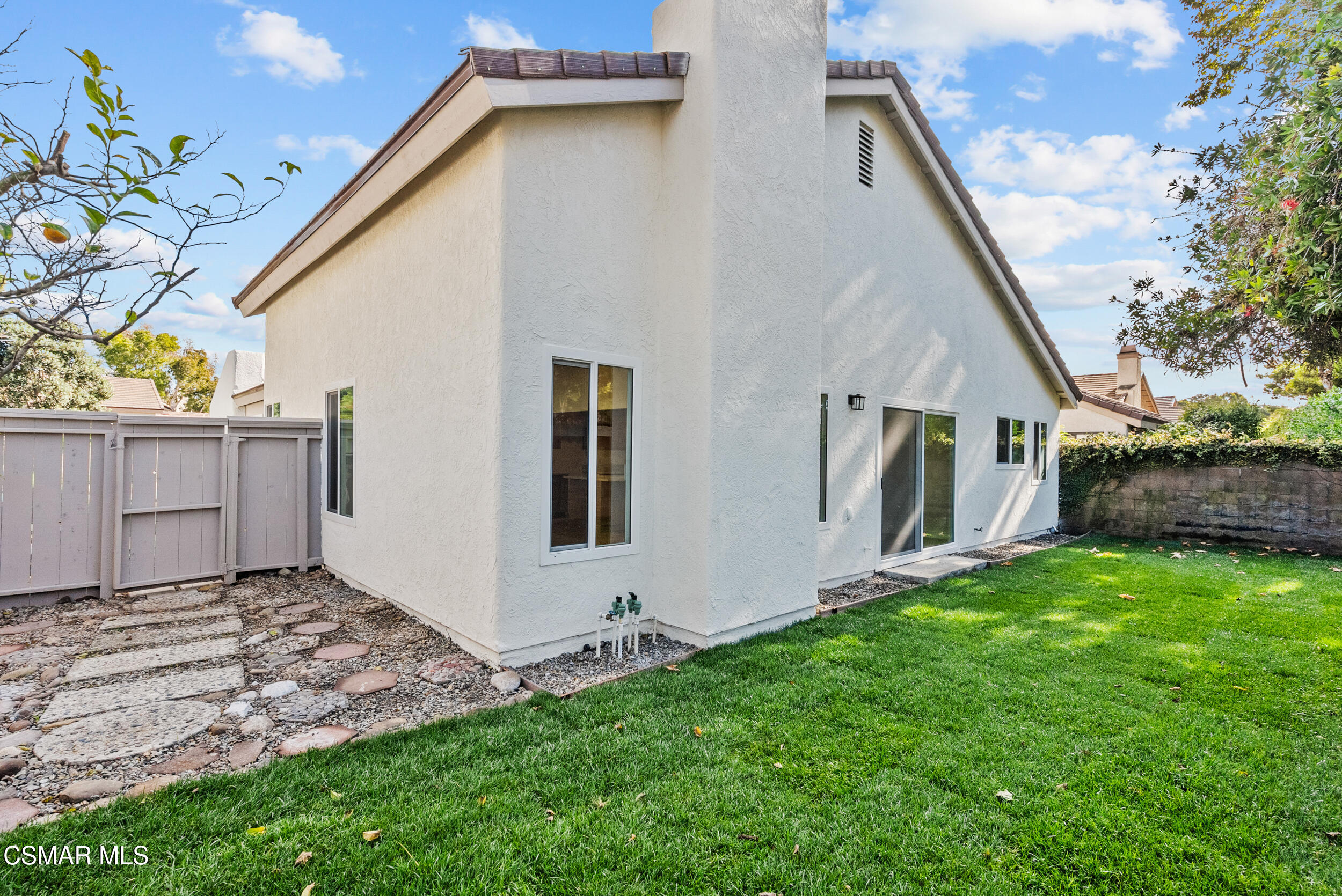 201 Village Road Port Hueneme, CA 93041 - Photo 13 of 21 a backyard of a house with table and chairs