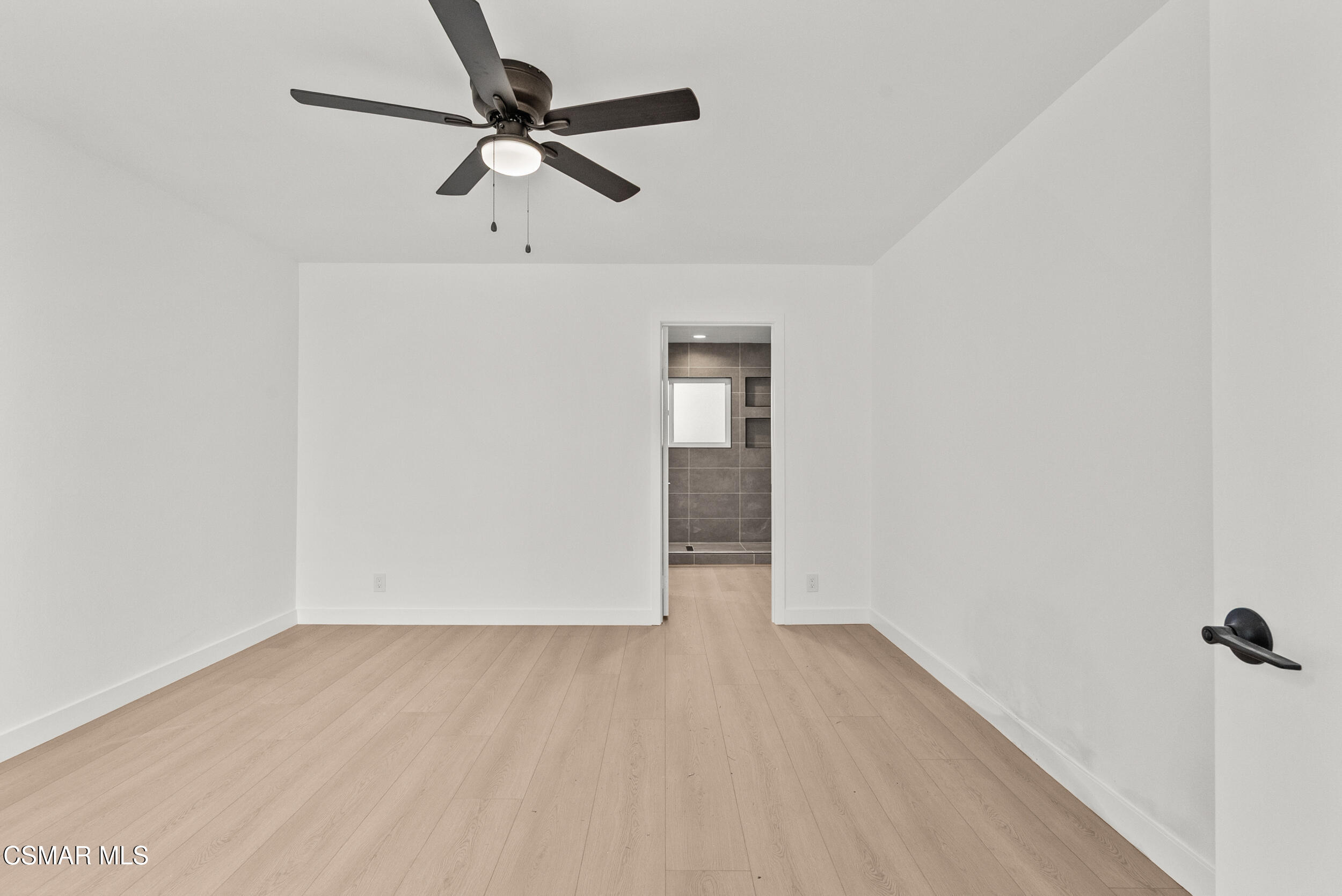 201 Village Road Port Hueneme, CA 93041 - Photo 9 of 21 a view of an empty room with a window