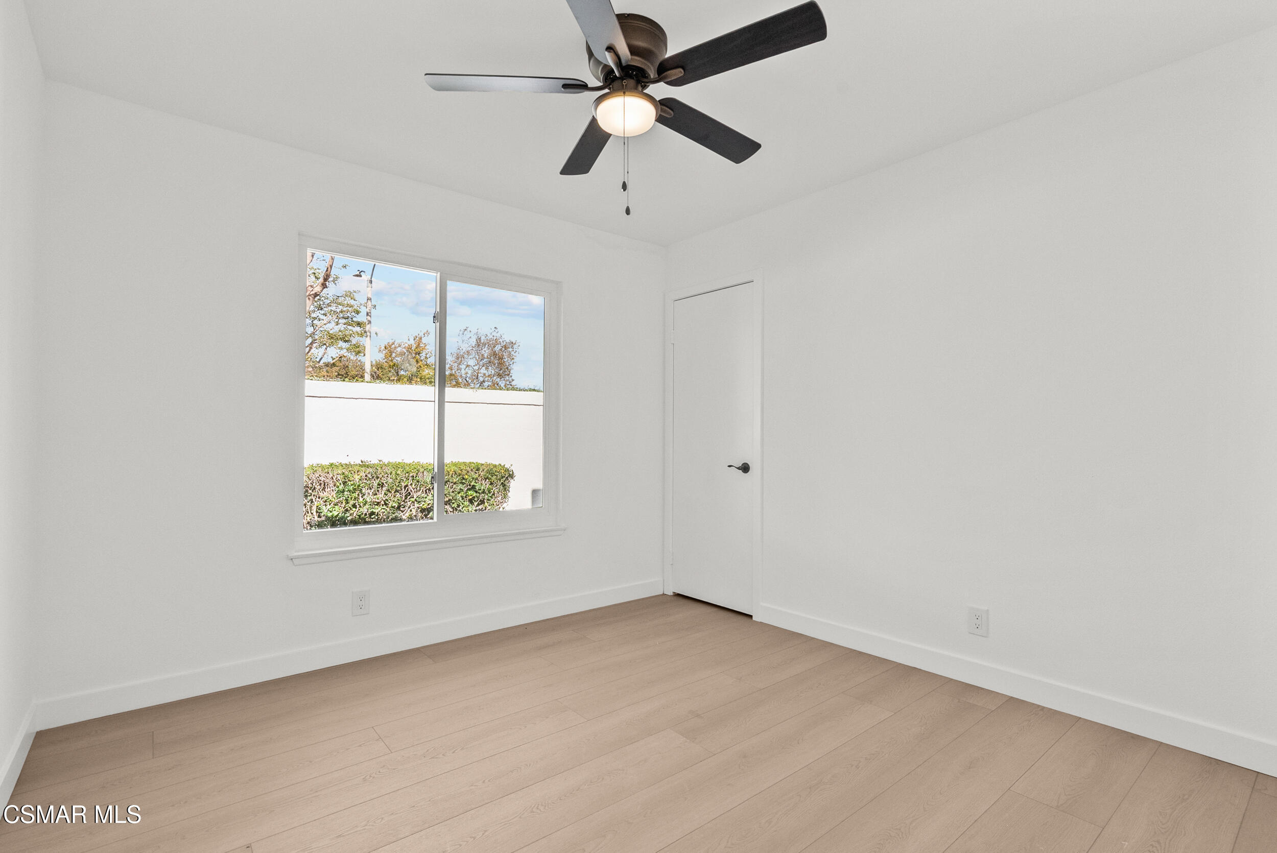 201 Village Road Port Hueneme, CA 93041 - Photo 10 of 21 an empty room with a window and a fan