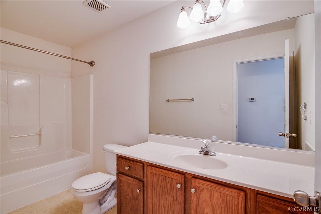 3931 Hazelnut Branch Road Midlothian, VA 23112 - Photo 31 of 34 a bathroom with a sink and a mirror