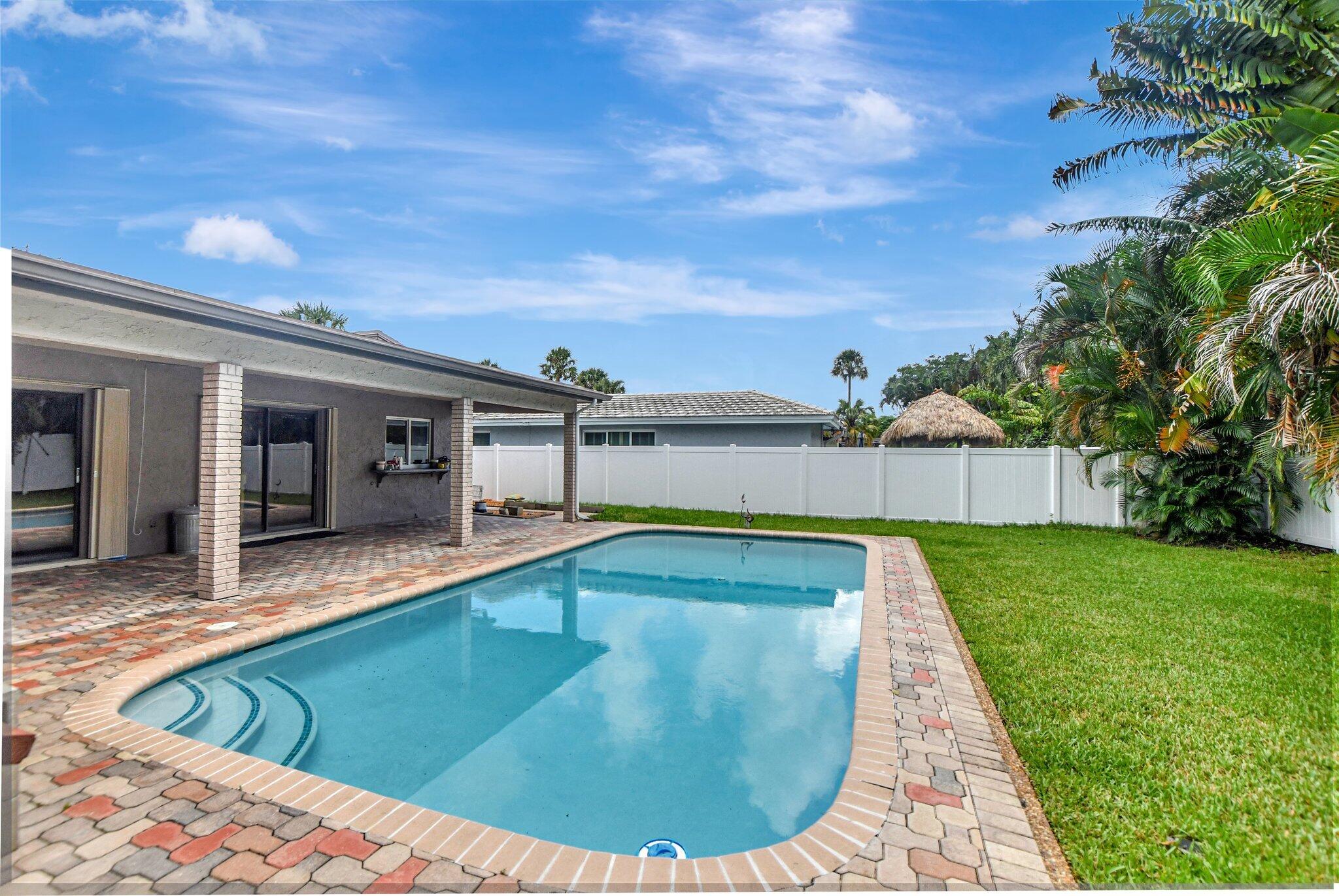 1398 Southwest 17th Street Boca Raton, FL 33486 - Photo 34 of 41 a view of a house with swimming pool