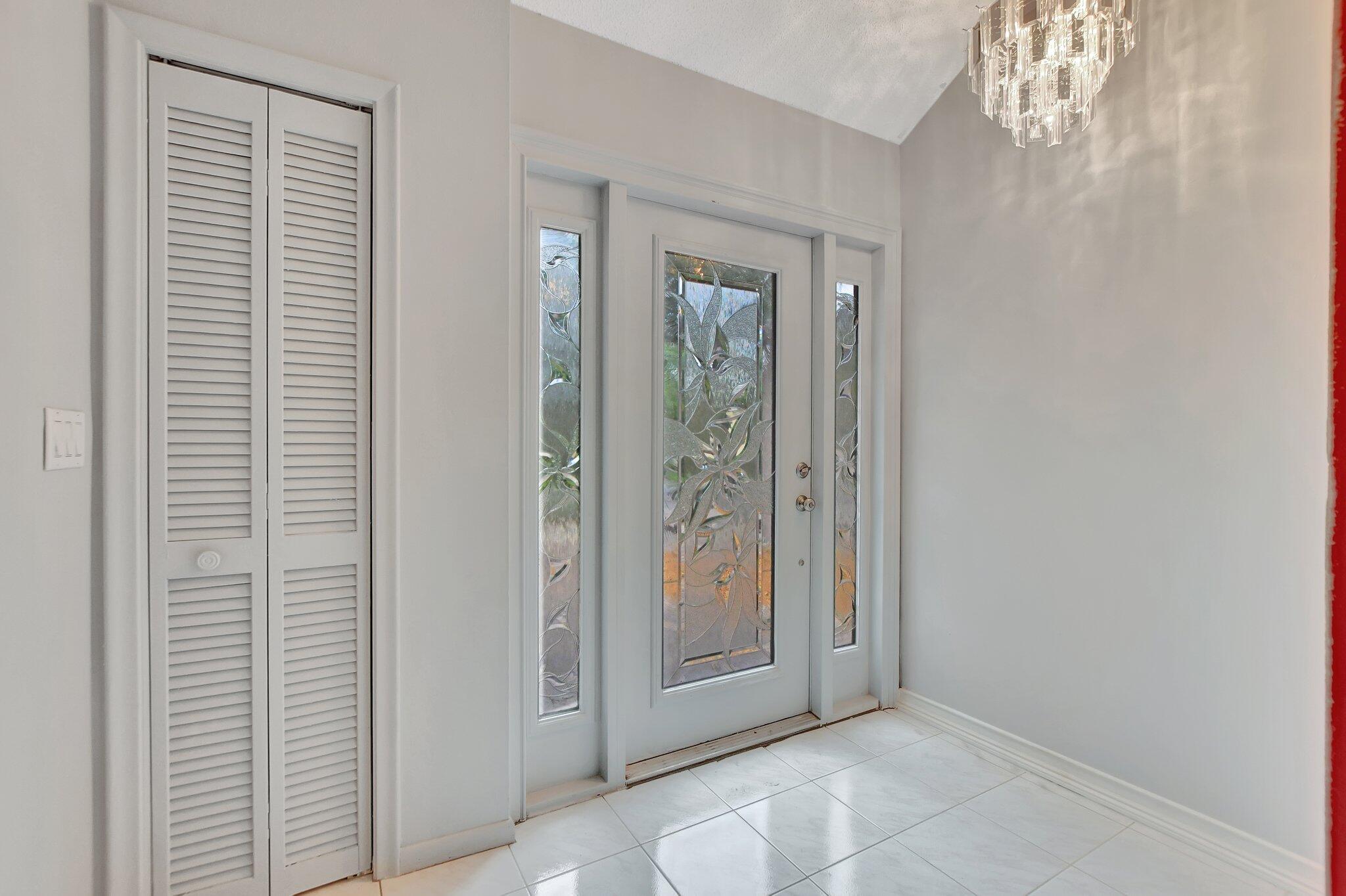 1398 Southwest 17th Street Boca Raton, FL 33486 - Photo 8 of 41 an empty room with windows