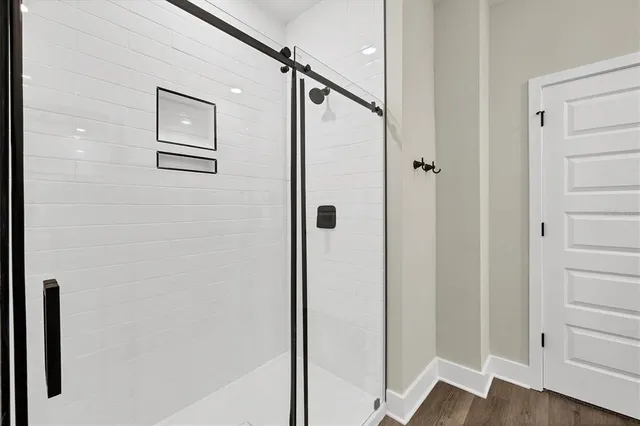 a bathroom with a granite countertop sink toilet and a mirror