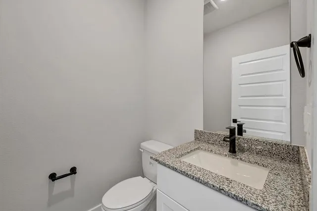 a view of a back yard of the house