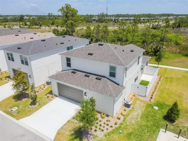 a view of a big yard with a fountain