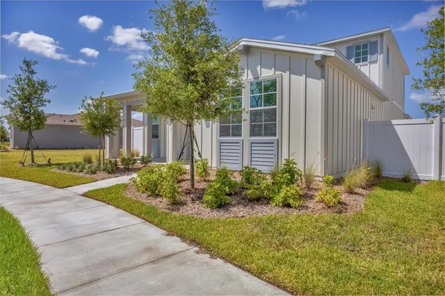 a house with garden in front of it
