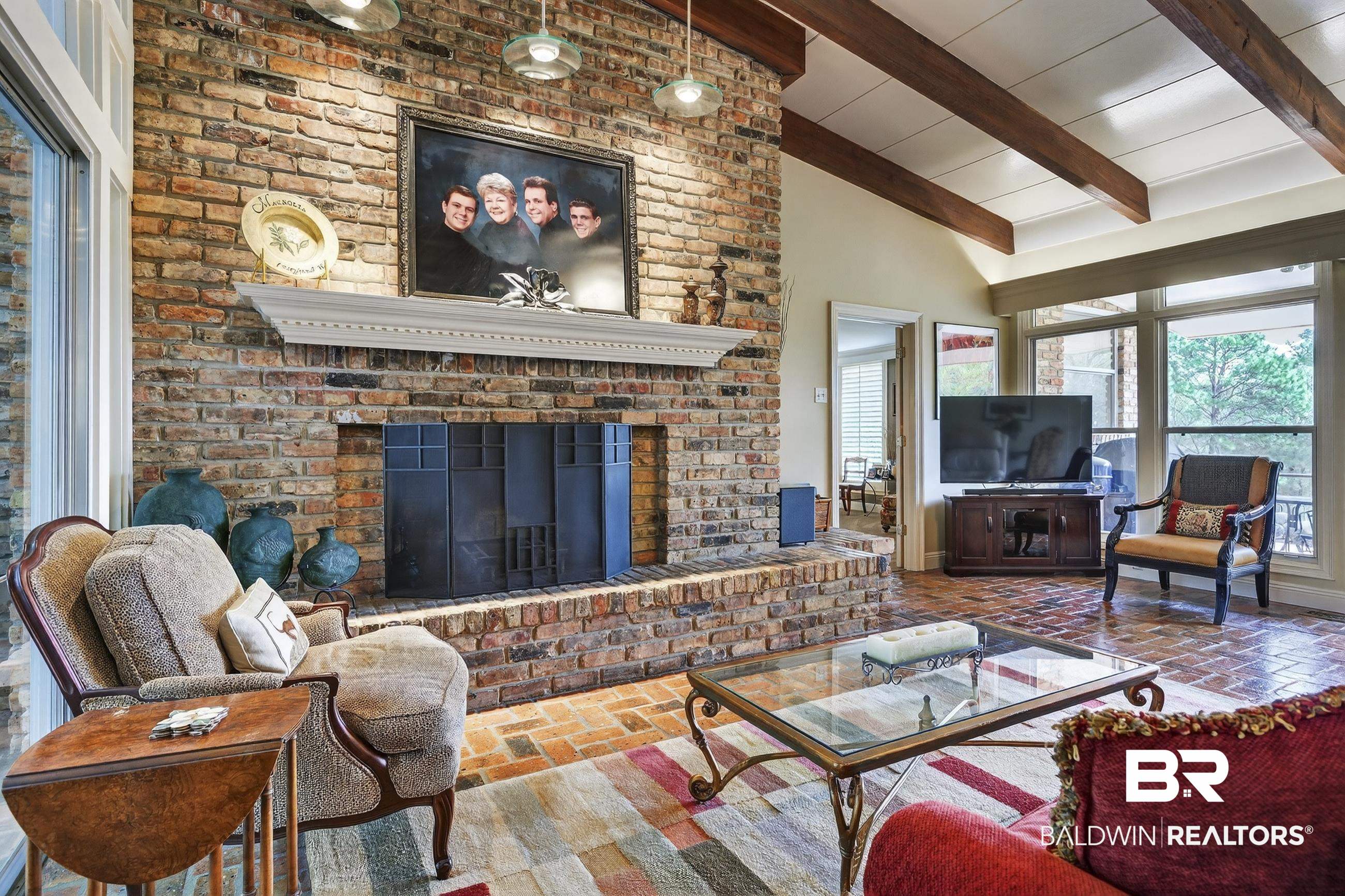 3175 Dawes Lake Road Mobile, AL 36619 - Photo 9 of 92 Living room featuring brick flooring, a brick fireplace, and lofted ceiling