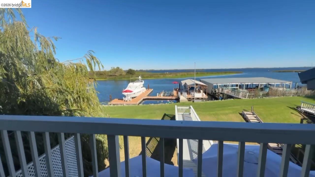 3777 Willow Road Bethel Island, CA 94511 - Photo 15 of 34 Water view featuring a dock and boat lift