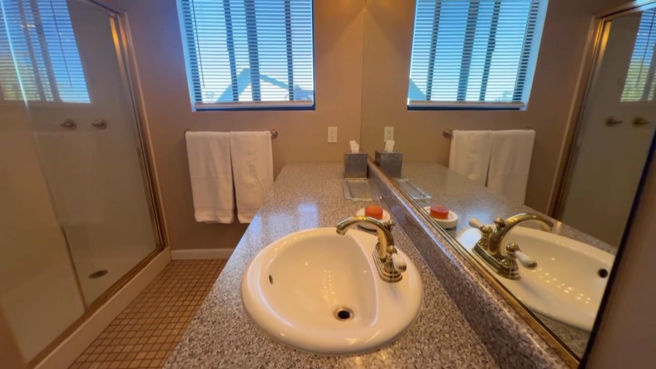 3777 Willow Road Bethel Island, CA 94511 - Photo 15 of 32 Bathroom with vanity, a stall shower, and light tile patterned flooring