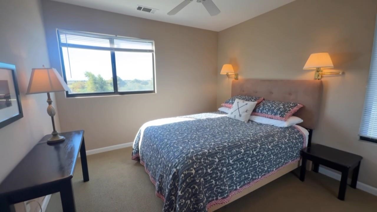 3777 Willow Road Bethel Island, CA 94511 - Photo 17 of 32 Bedroom featuring a ceiling fan and carpet floors