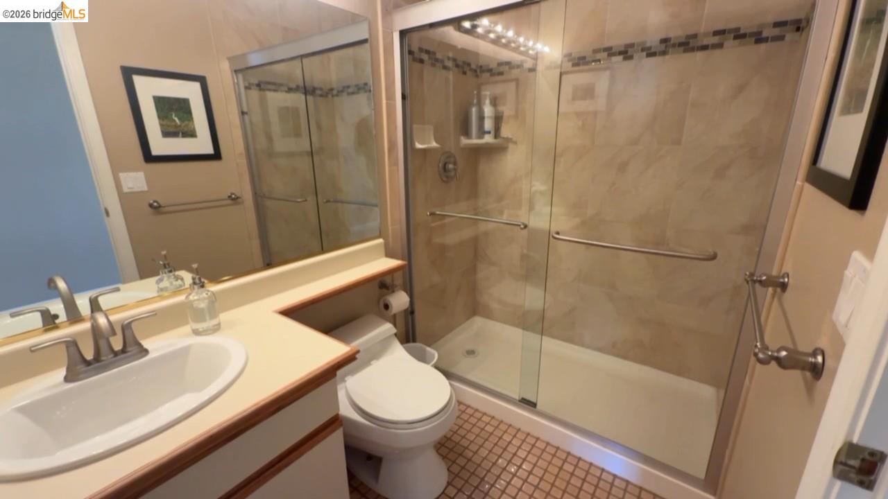 3777 Willow Road Bethel Island, CA 94511 - Photo 17 of 34 Full bath with vanity, a stall shower, and tile patterned flooring