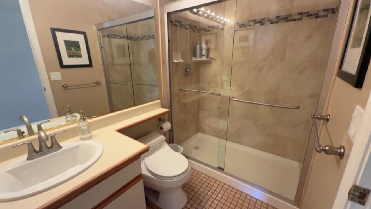 3777 Willow Road Bethel Island, CA 94511 - Photo 18 of 32 Full bath with vanity, a stall shower, and tile patterned flooring
