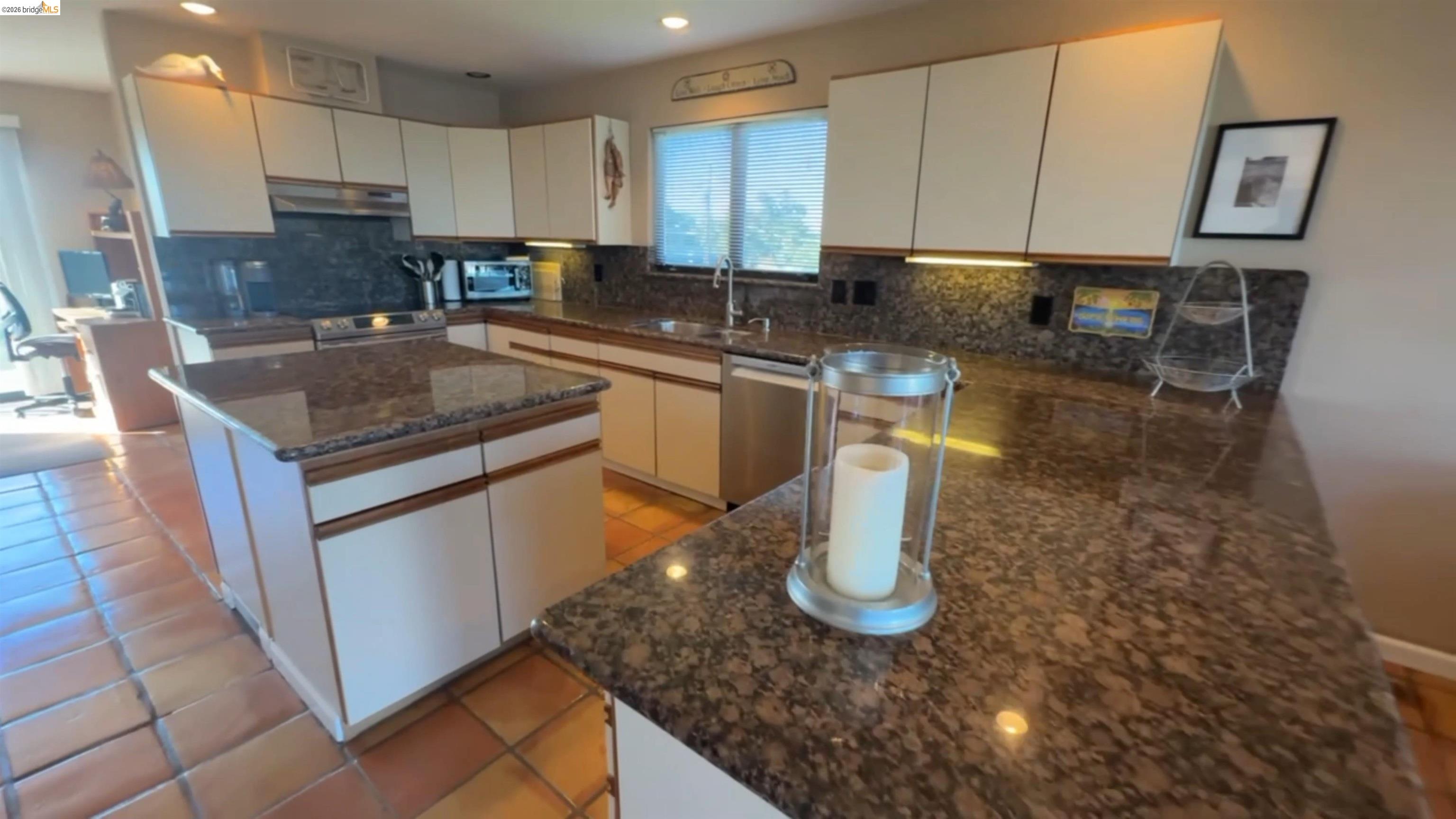 3777 Willow Road Bethel Island, CA 94511 - Photo 22 of 34 Kitchen featuring tasteful backsplash, white cabinets, stainless steel appliances, dark stone countertops, and recessed lighting