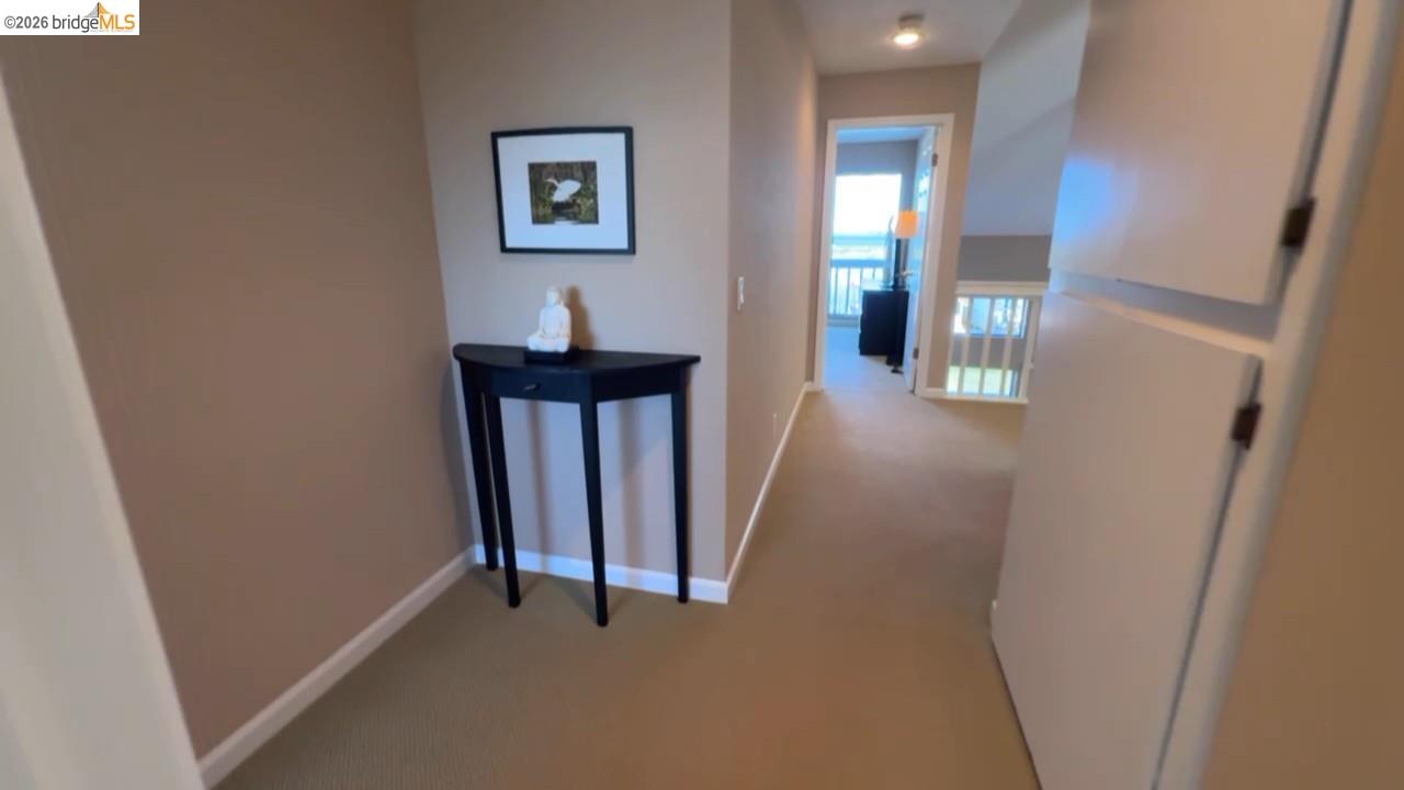 3777 Willow Road Bethel Island, CA 94511 - Photo 30 of 34 Hall with baseboards and carpet flooring