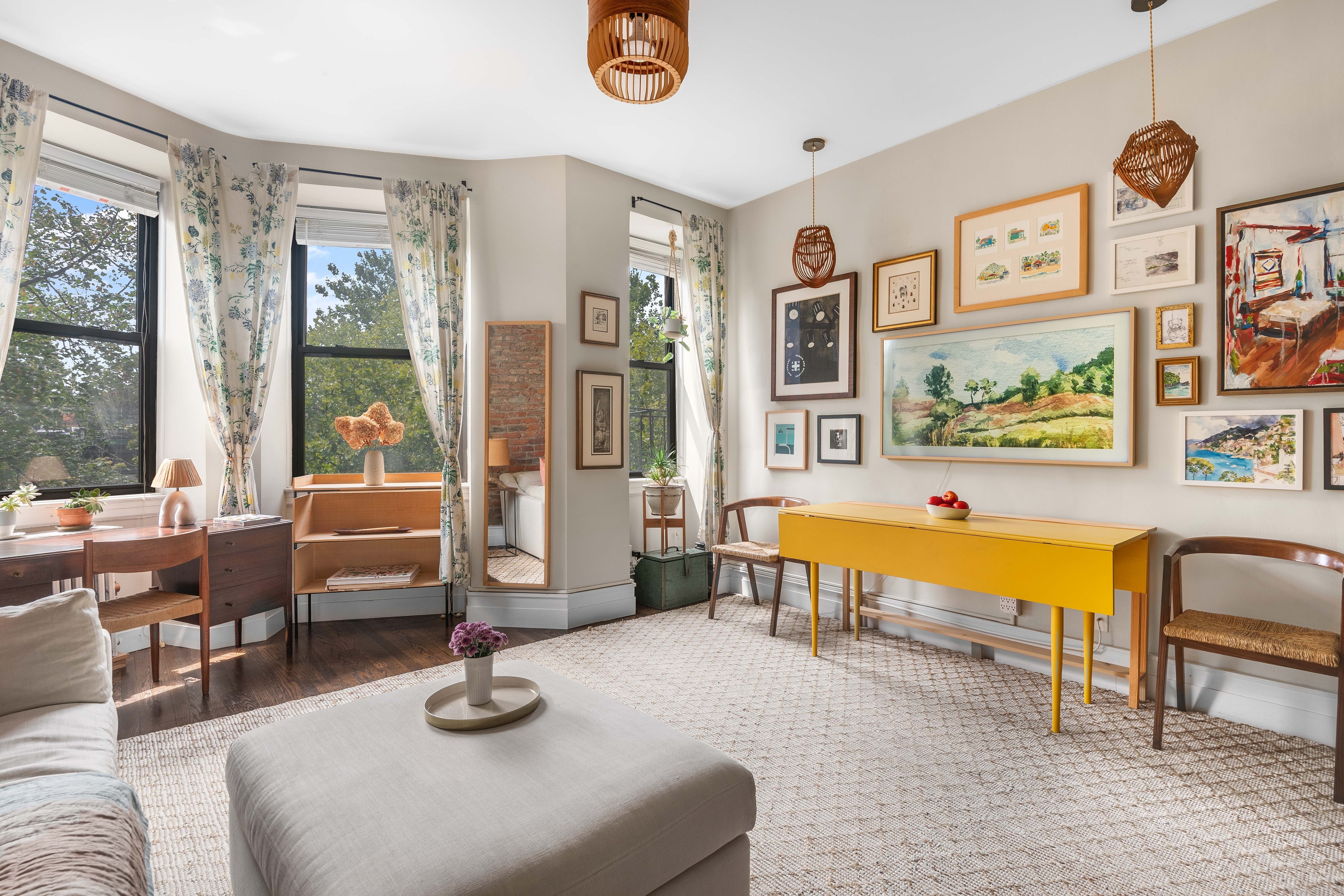 175 Amity Street, Unit D3 Brooklyn, NY 11201 - Photo 2 of 10 a living room with furniture and a large window