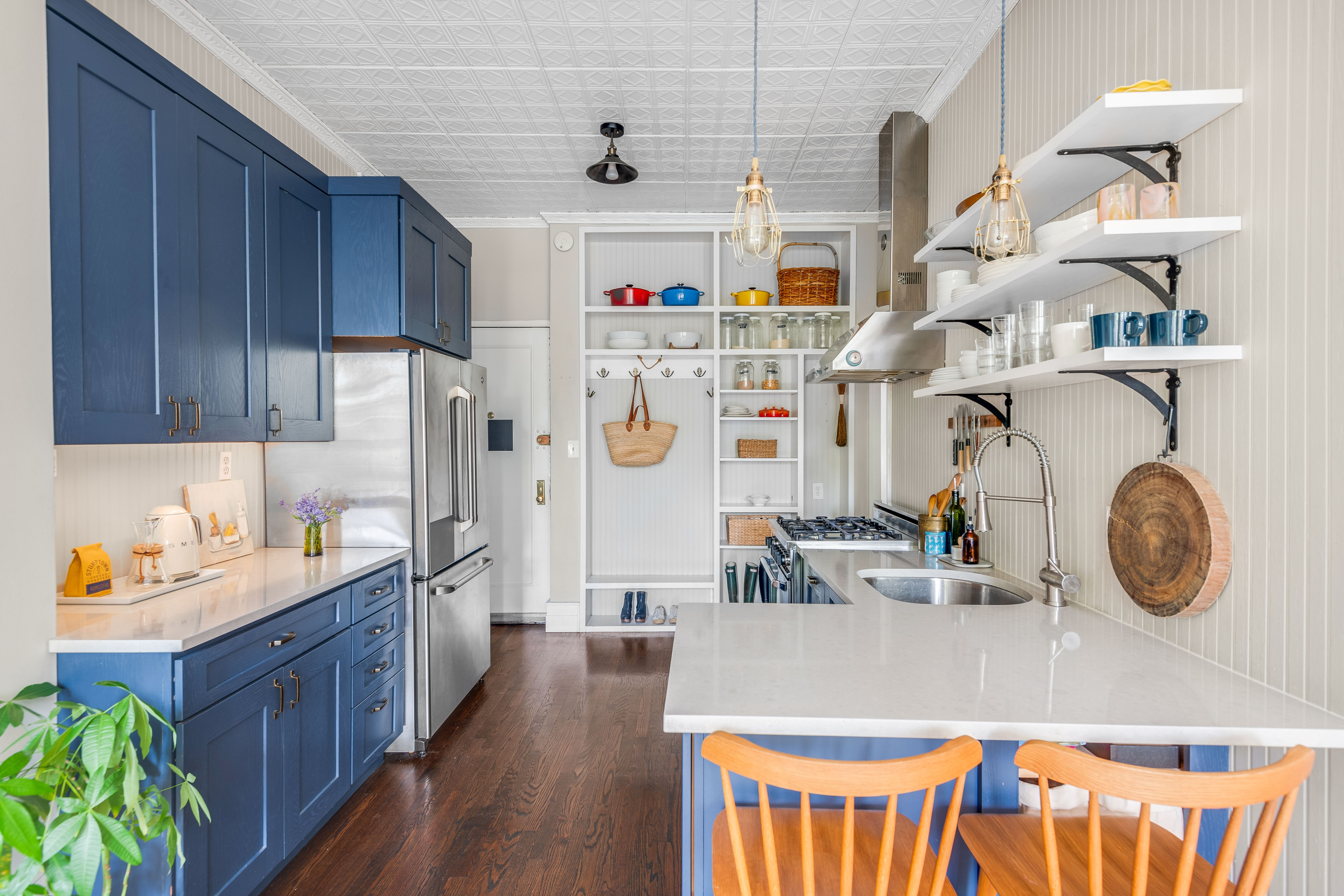 175 Amity Street, Unit D3 Brooklyn, NY 11201 - Photo 4 of 10 a kitchen with stainless steel appliances granite countertop a sink dishwasher stove and refrigerator with wooden floor