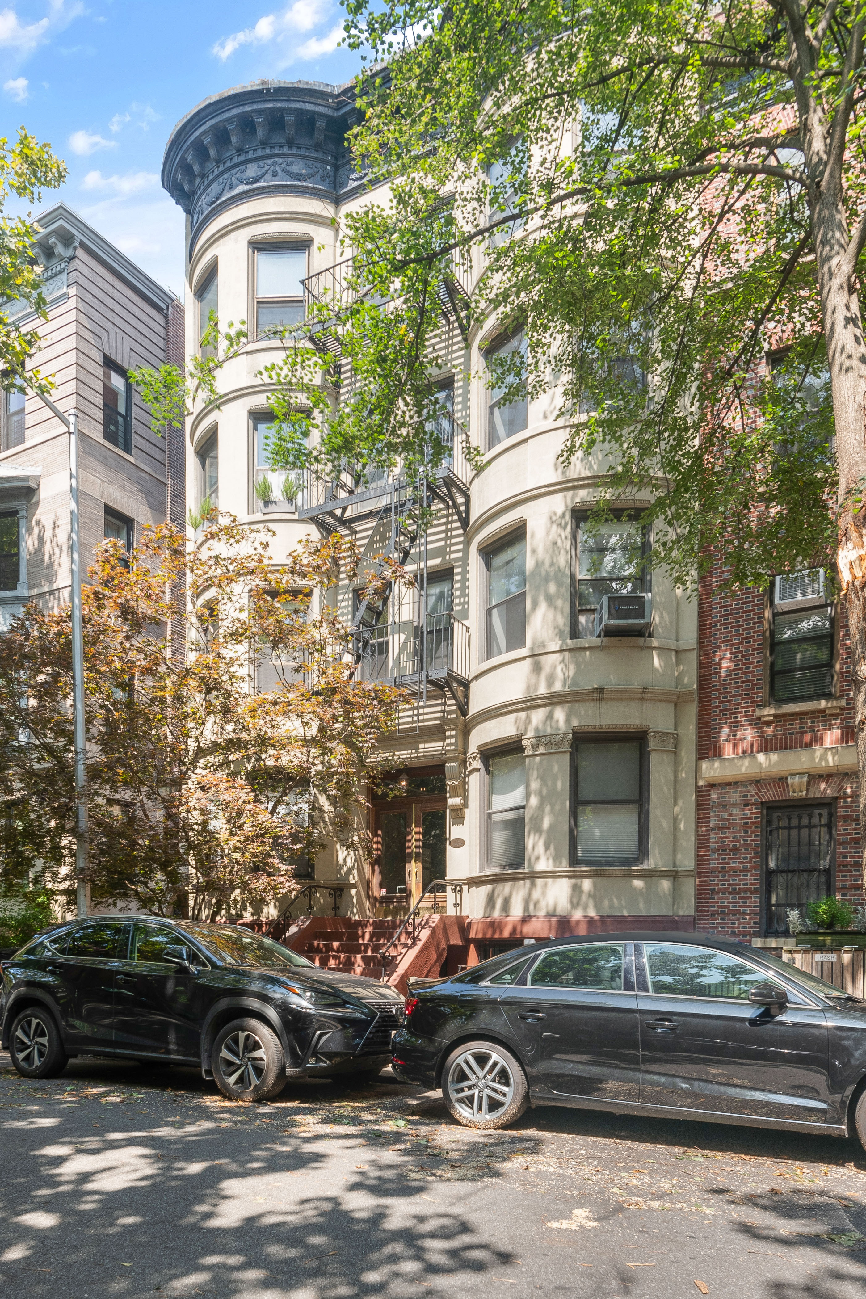 175 Amity Street, Unit D3 Brooklyn, NY 11201 - Photo 9 of 10 a front view of a residential apartment building with a yard