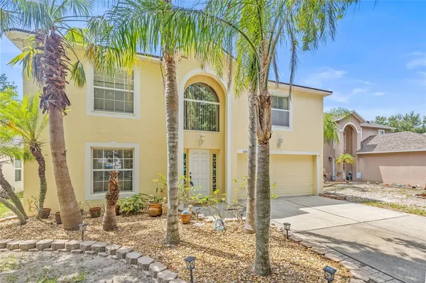 a view of a house with a patio